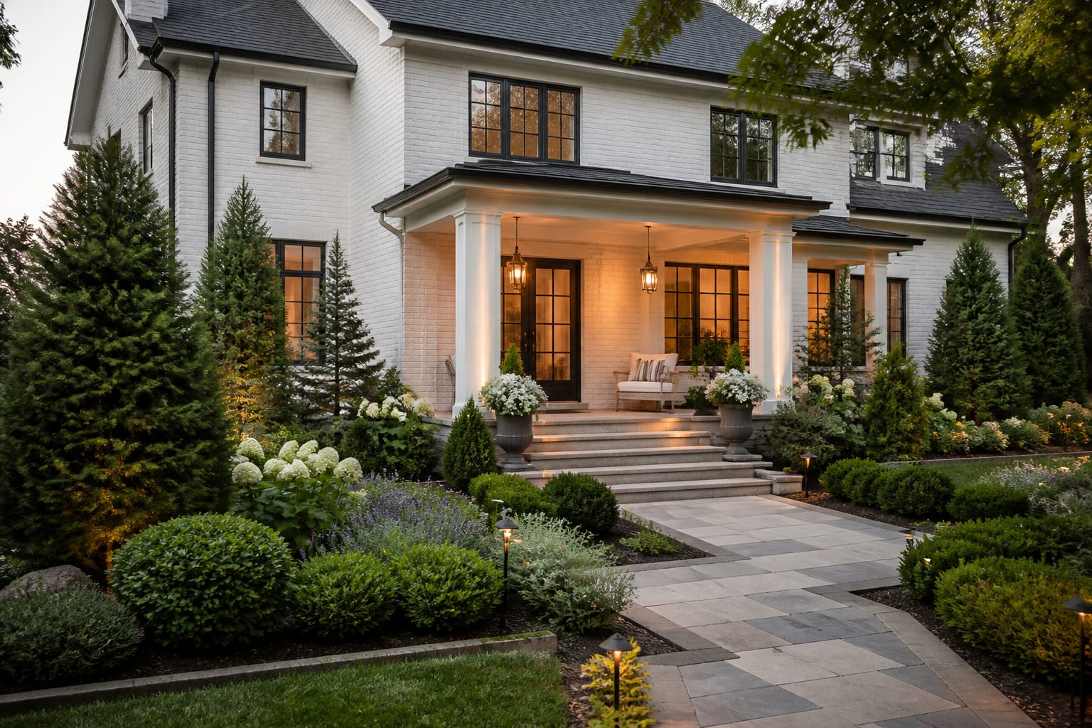 front yard AI preview showing deeper foundation beds, a clear walkway, layered evergreen shrubs, and warm porch lighting