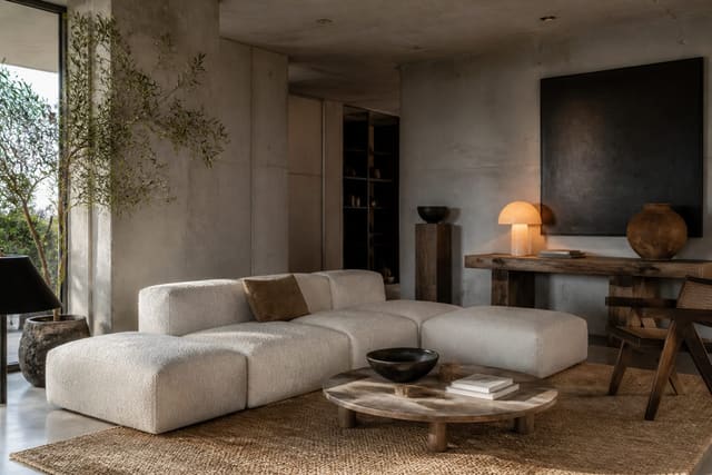 Concrete Interior Design Ideas: Industrial to Residential, shown as warm editorial Re-Design photography with believable residential scale, no overlaid text, no watermark