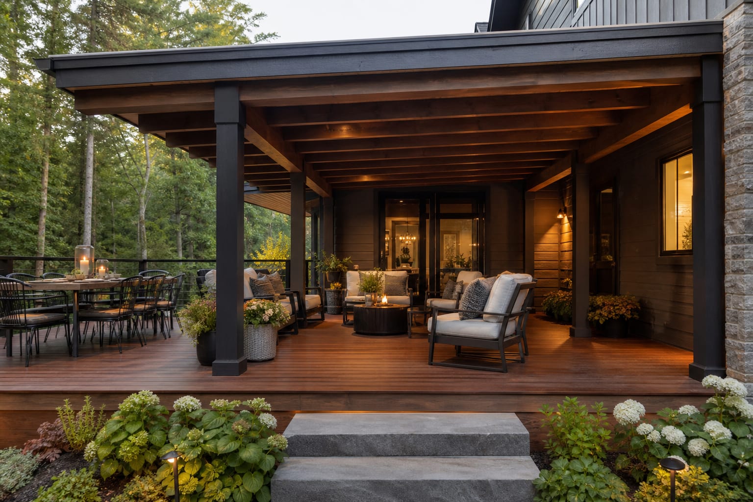 covered deck framing with posts aligned to beams, open chair clearance, and a partial roof directing water away from the house