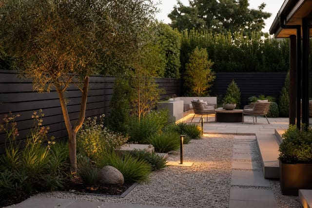 Gravel Garden Ideas: The Low-Maintenance Alternative to Lawn shown as a photorealistic outdoor redesign with layered materials, planting, lighting, and clear circulation